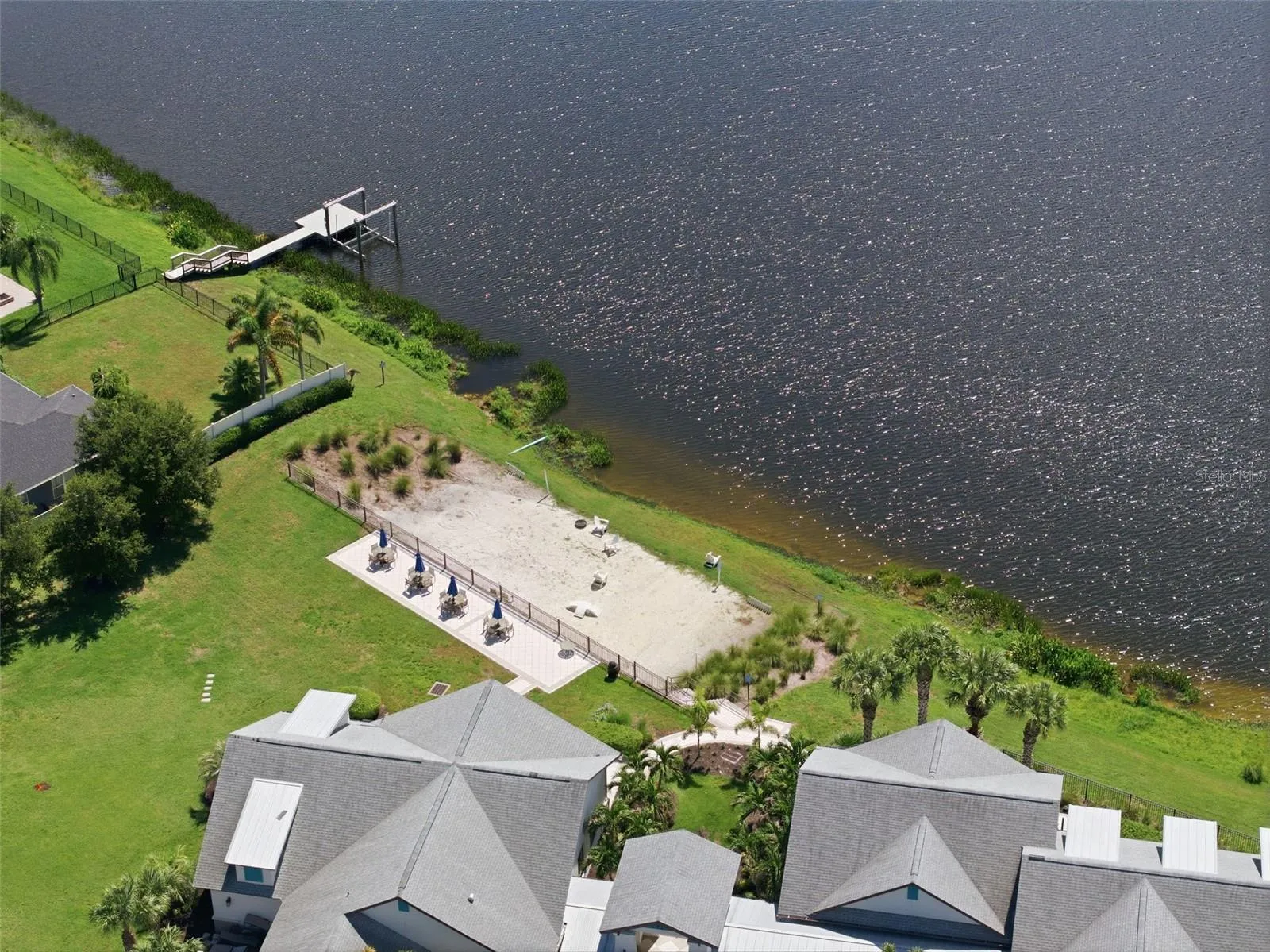 Community lakefront area and floating dock on Lucaya Lake.
