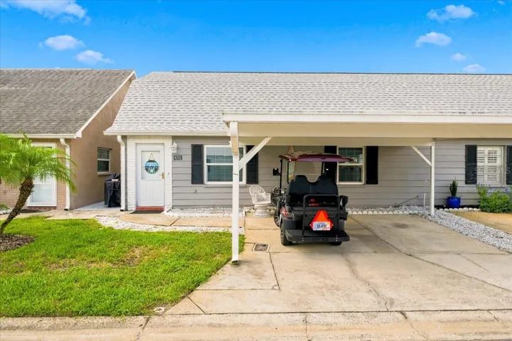 Front. Double covered carport
