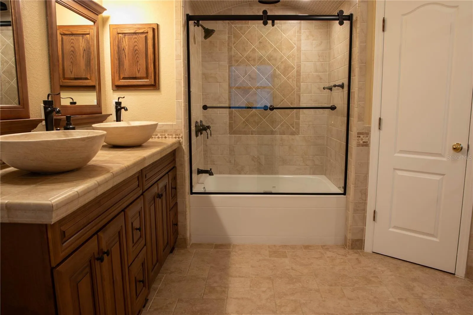 Primary Bathroom Glass Door Tub