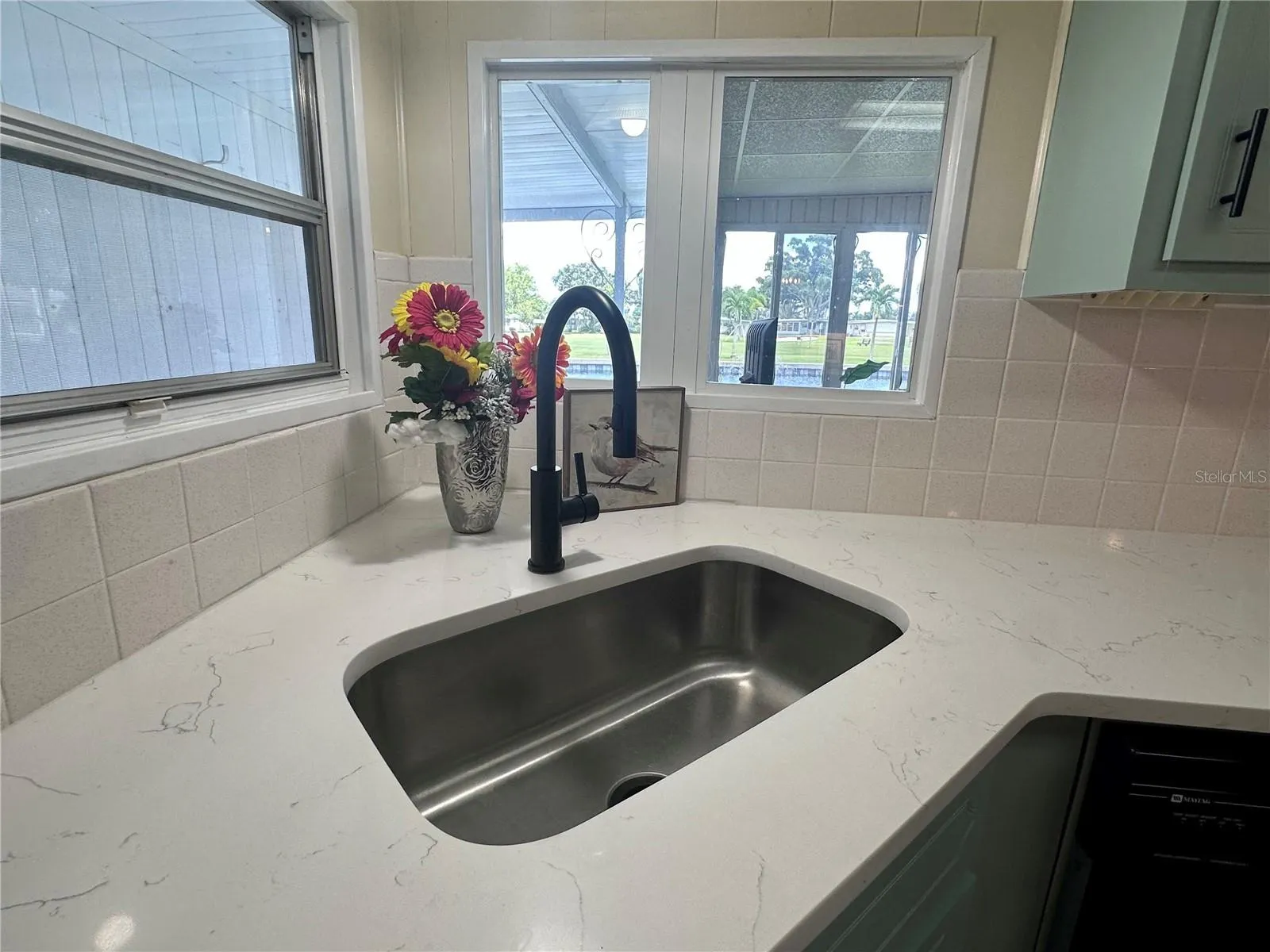 Quartz Counter Tops and oversized undermount sink.