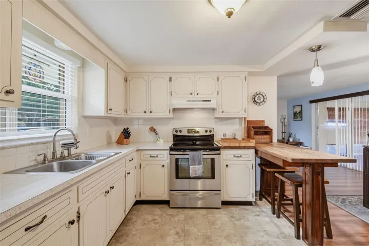 Breakfast Bar divides Kitchen from Dining Area