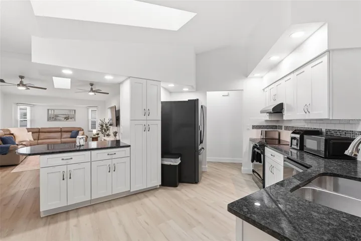 Kitchen with natural lighting from skylights