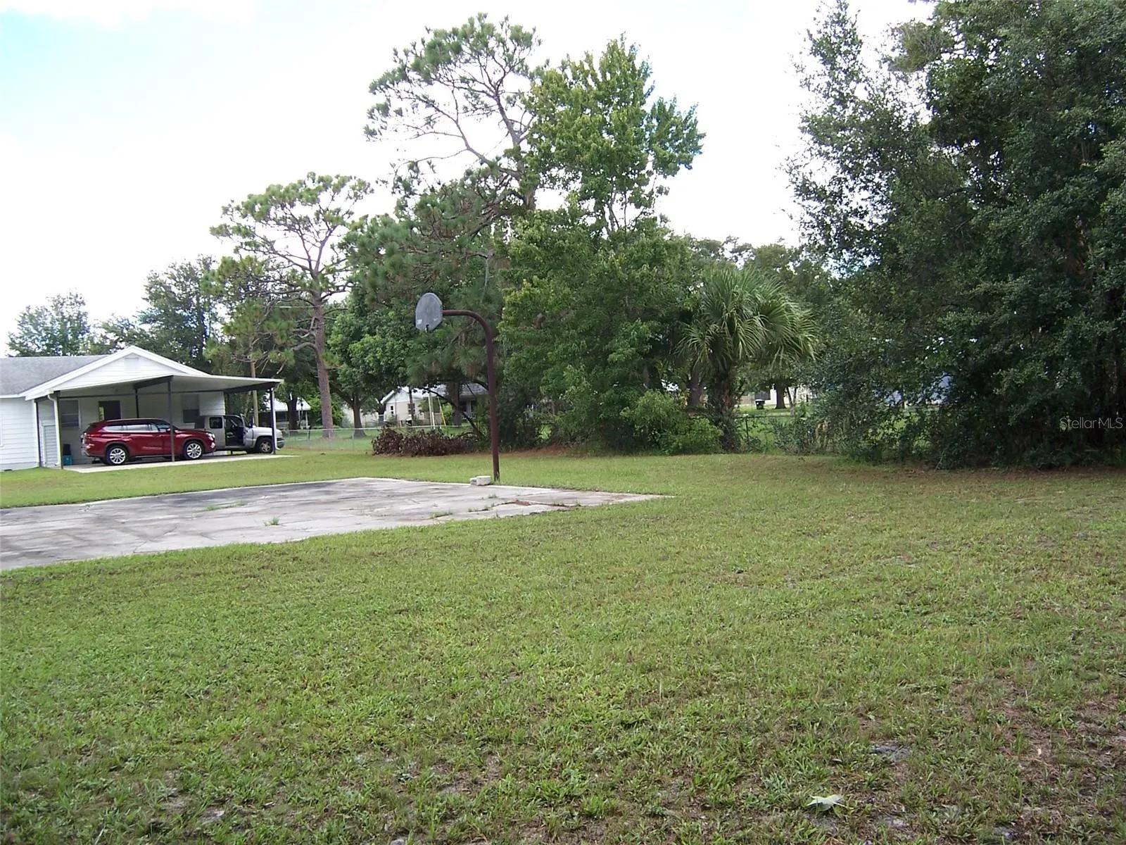 OVER 1/2 ACRE FENCED PROPERTY