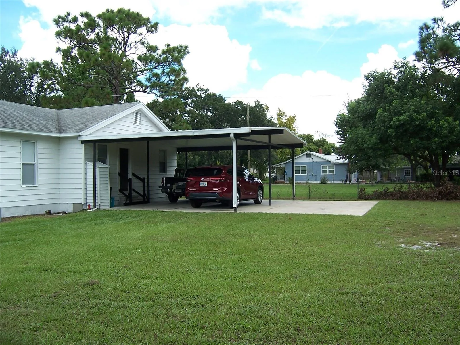 REAR PATIO OR CARPORT