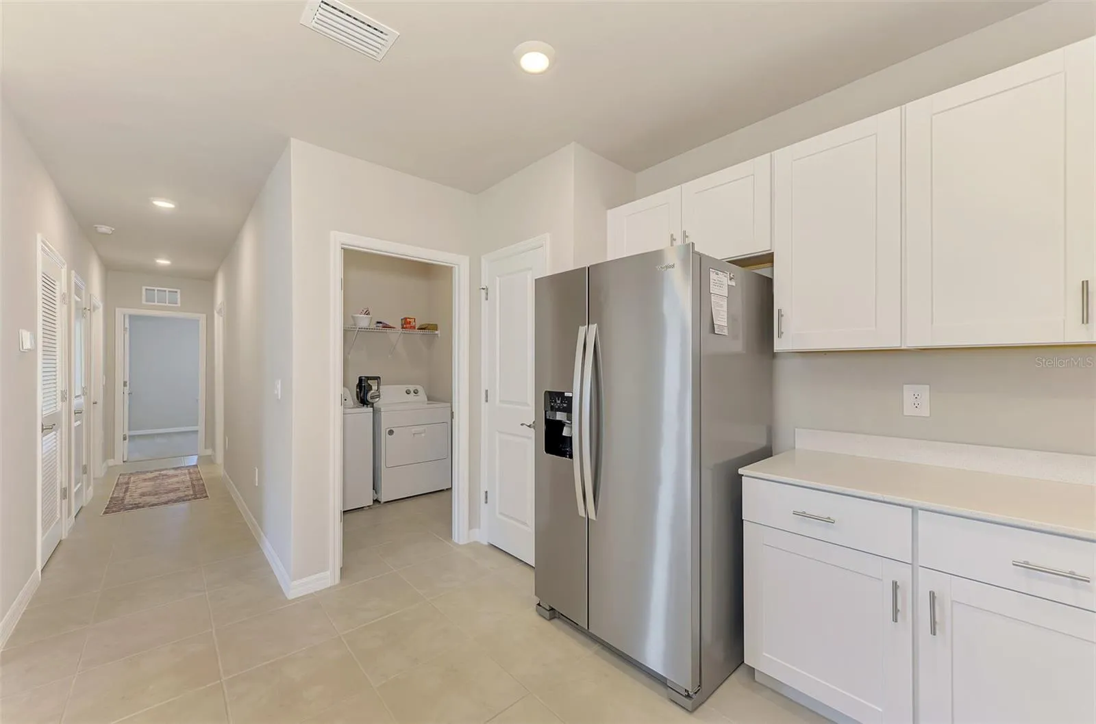 INSIDE LAUNDRY ROOM WITH W/D