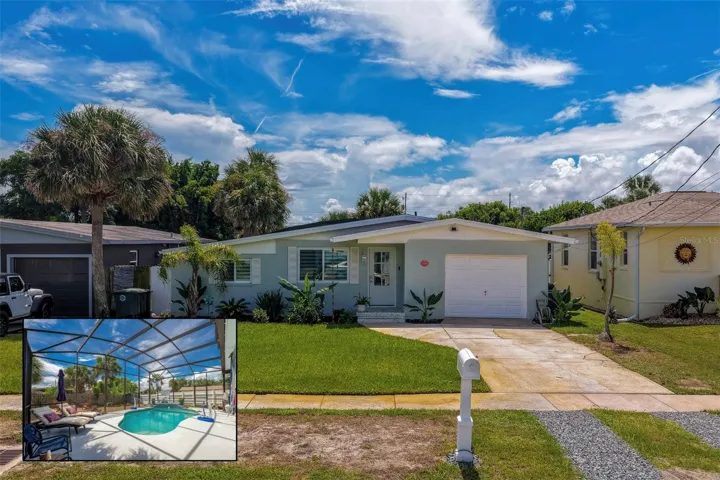 Renovated home with tropical landscaping, an attached garage, and a welcoming front entry. The inset highlights a screened-in pool and spacious deck area, ideal for relaxing or outdoor entertaining.
