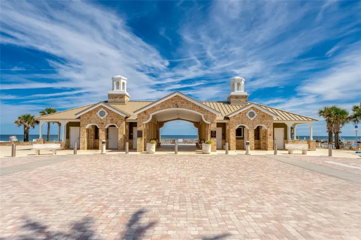Attractive oceanfront pavilion at Andy Romano Beachfront Park provides a distinctive coastal setting with the Atlantic Ocean visible through the central breezeway.