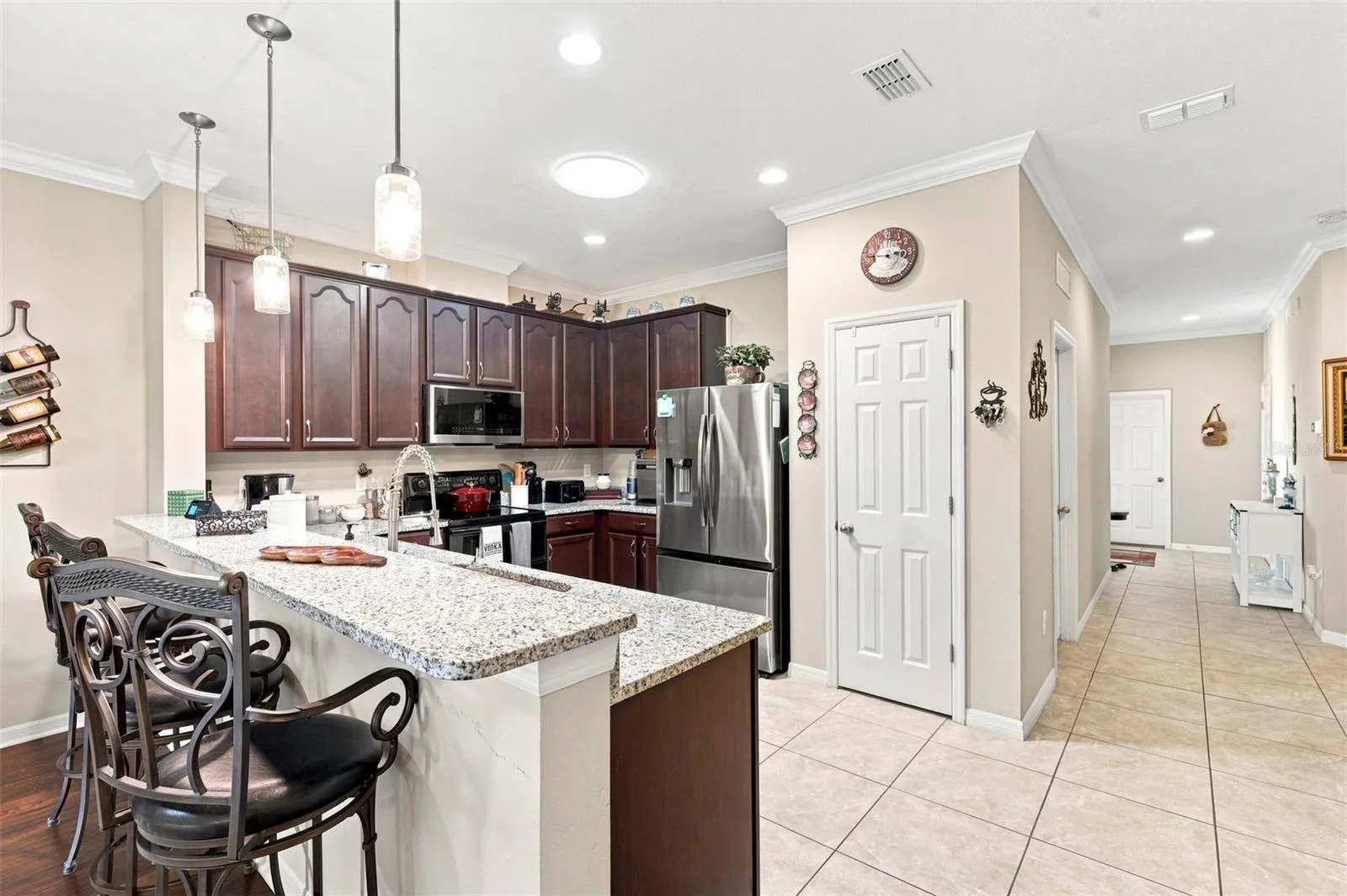 Kitchen and hallway. Suntubes enhance the natrual light