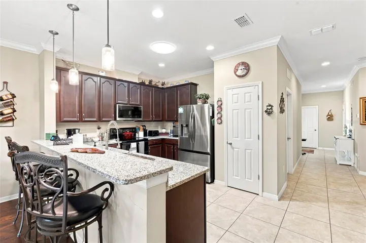 Kitchen and hallway. Suntubes enhance the natrual light