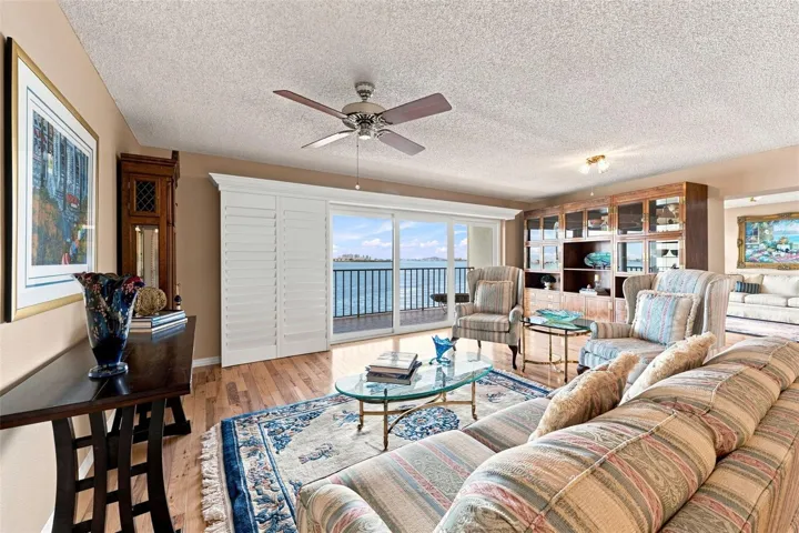 Family room with access to shared balcony with living room