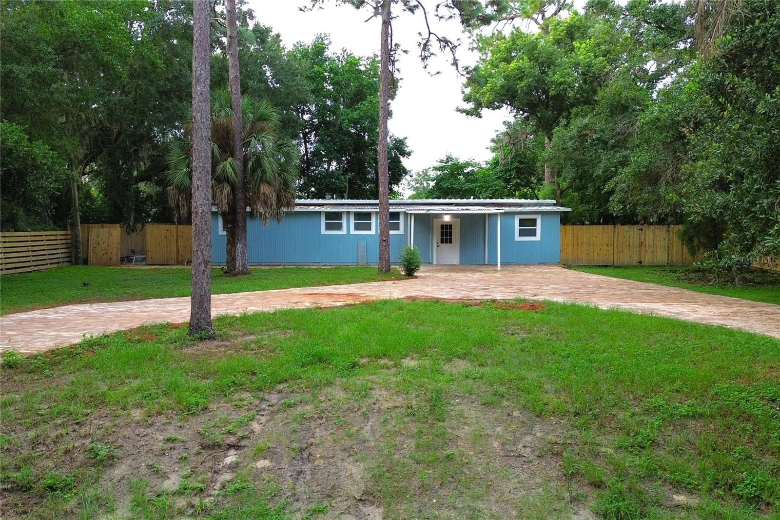 FRONT AND PAVER DRIVE WAY