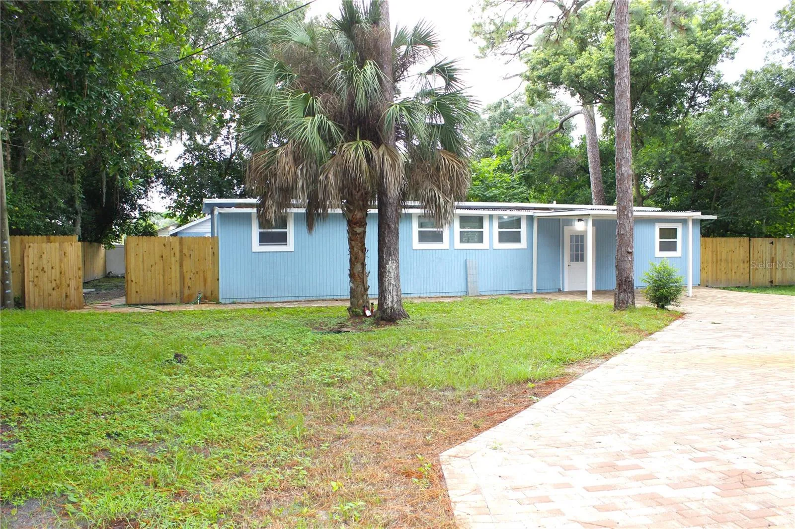 FRONT AND PAVER DRIVE WAY