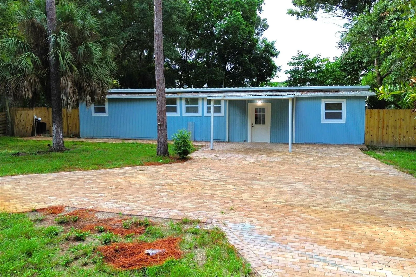 FRONT AND PAVER DRIVE WAY