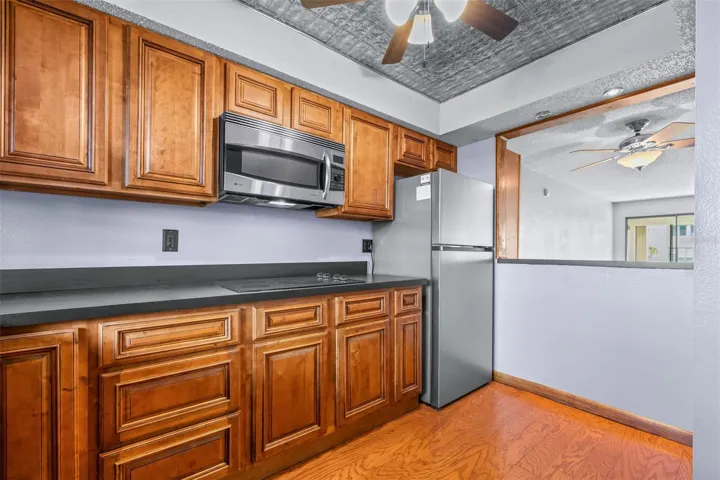Brand new refrigerator with pass-through to dining/living area