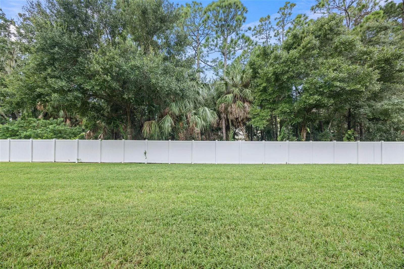 Rear of property with View of Green Area