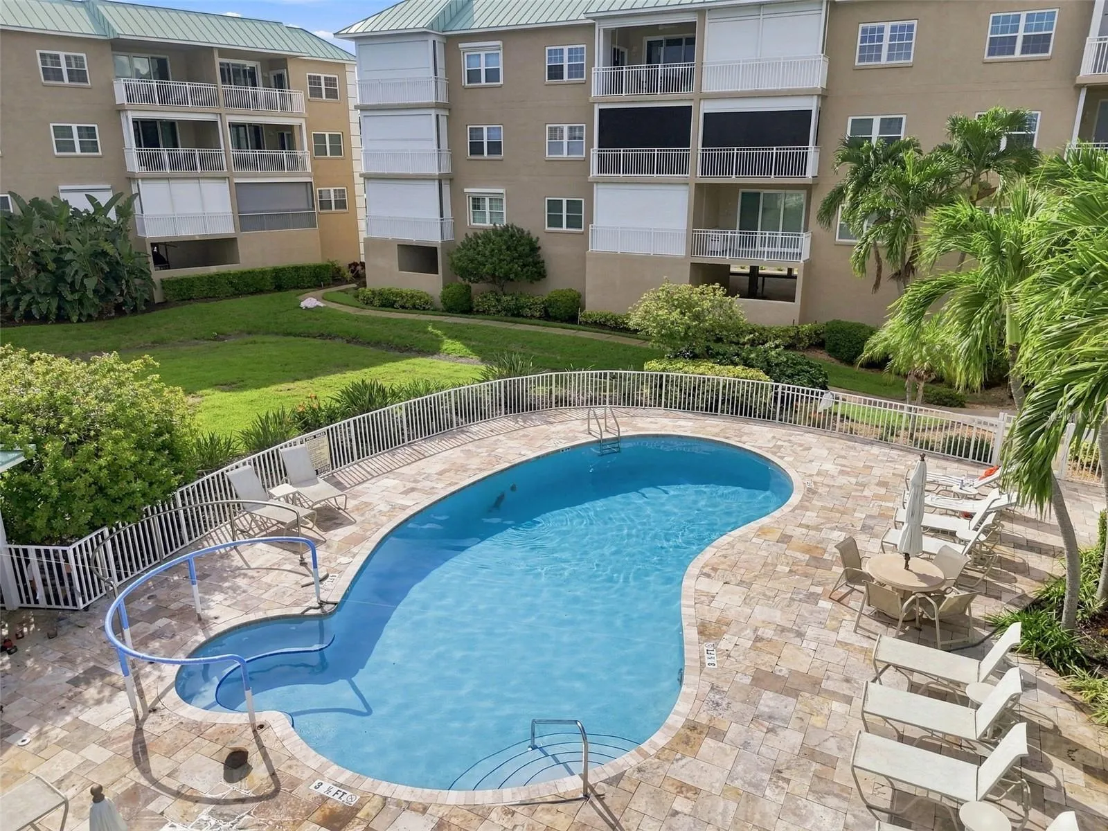 Swimmin pool adjacent to clubhouse