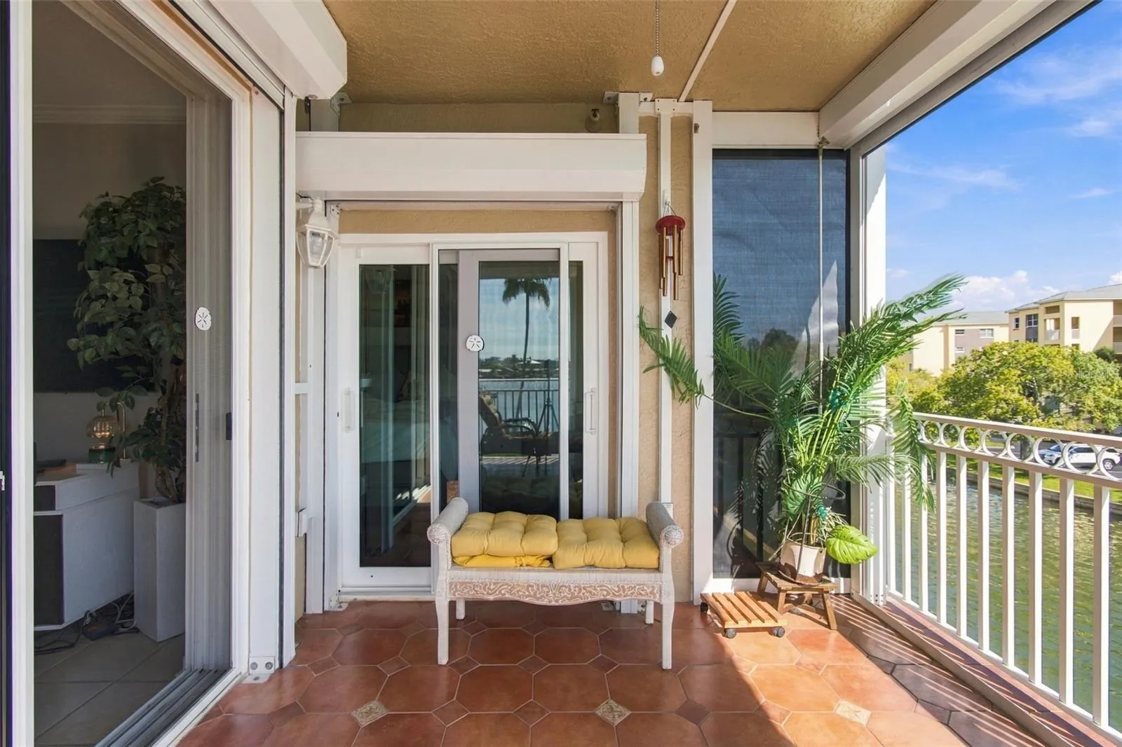 Balcony showing Hurricane shutters on sliding glass doors