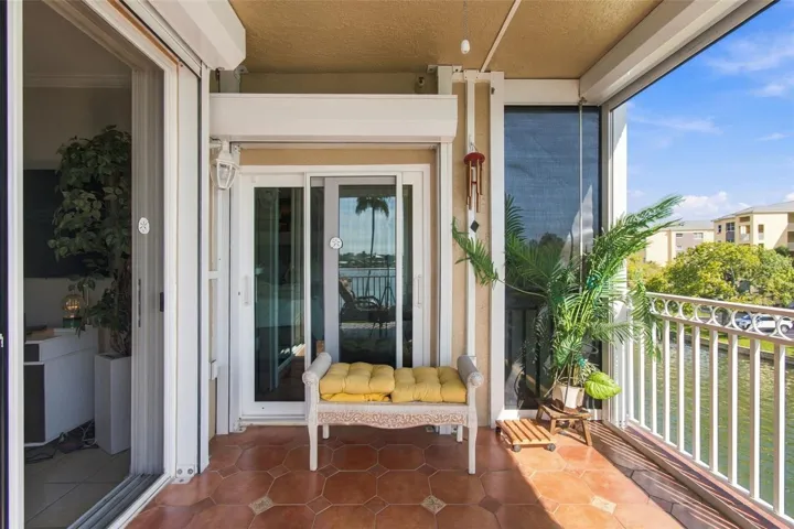 Balcony showing Hurricane shutters on sliding glass doors