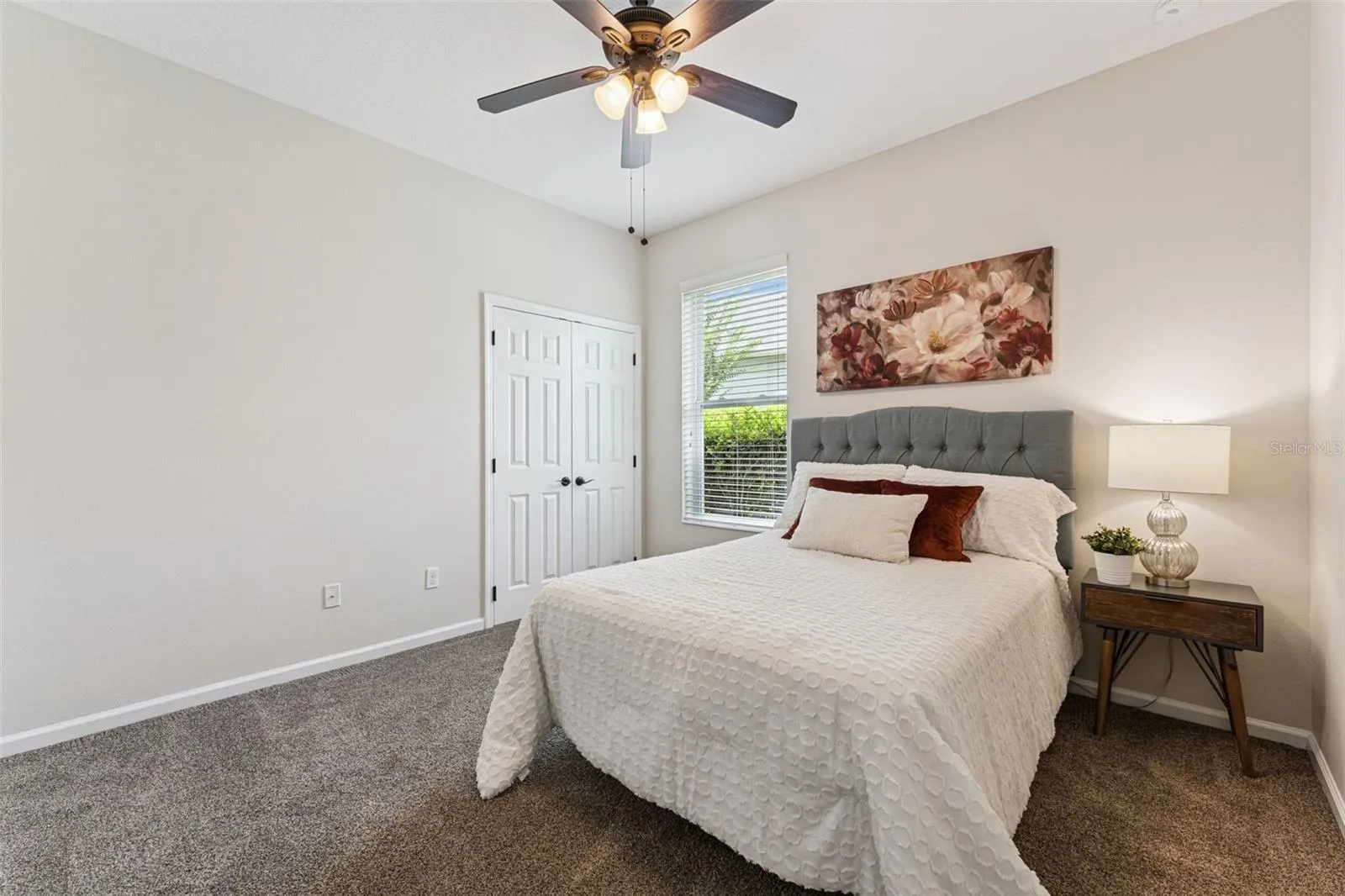11'6" x 11'6" Bedroom #2 w/ a ceiling fan