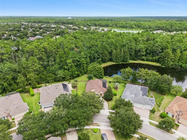 Aerial view of the home's location w/ a Pond & Conservation area view