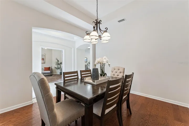 View from the Dining Room to Foyer entryway & Den/office area