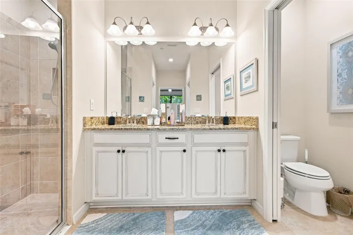 Primary Bedroom ensuite bathroom with duel sinks &amp; walk in shower