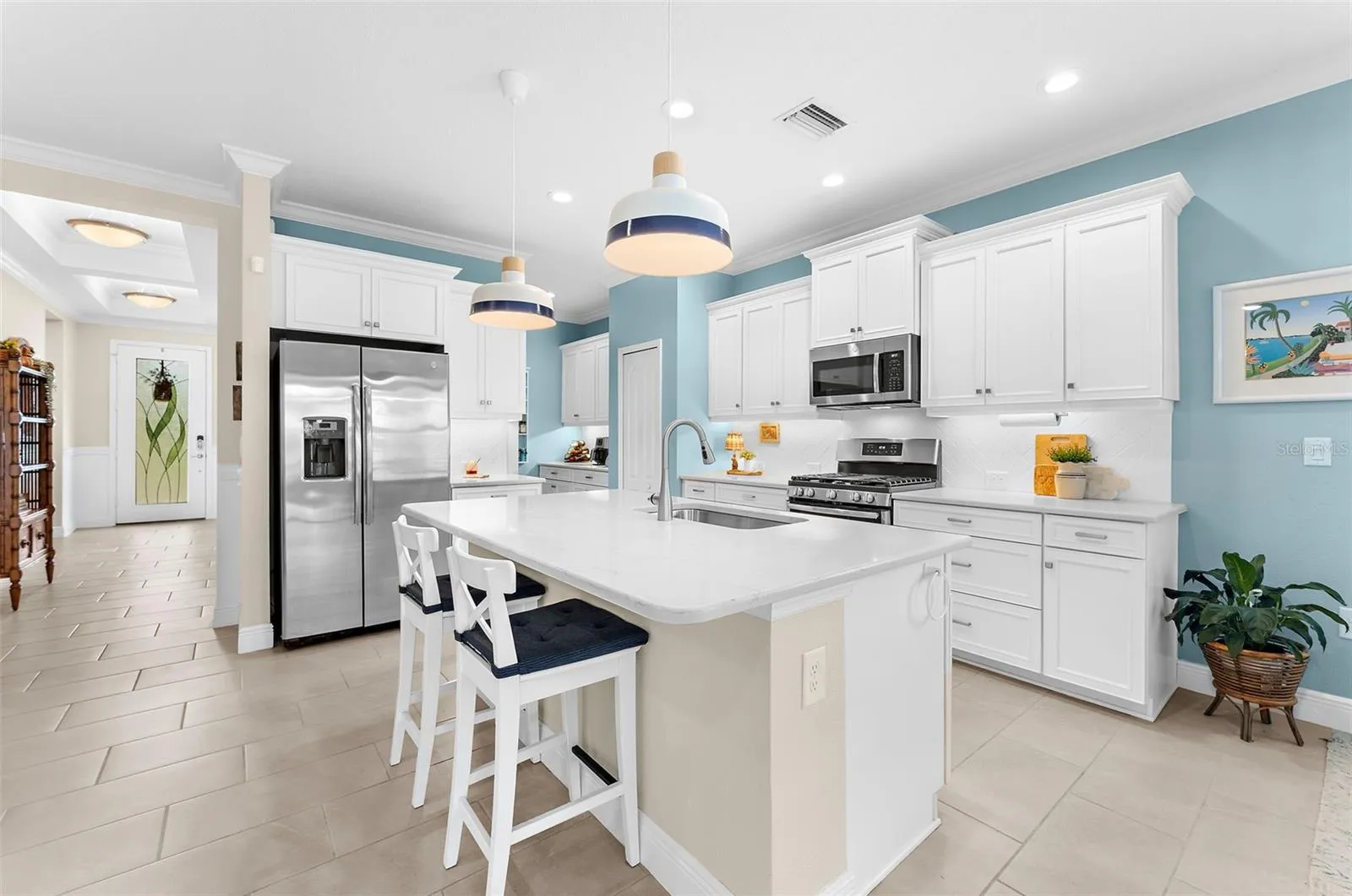 Kitchen is incredible with extra butler pantry in the nook next to the refrigerator