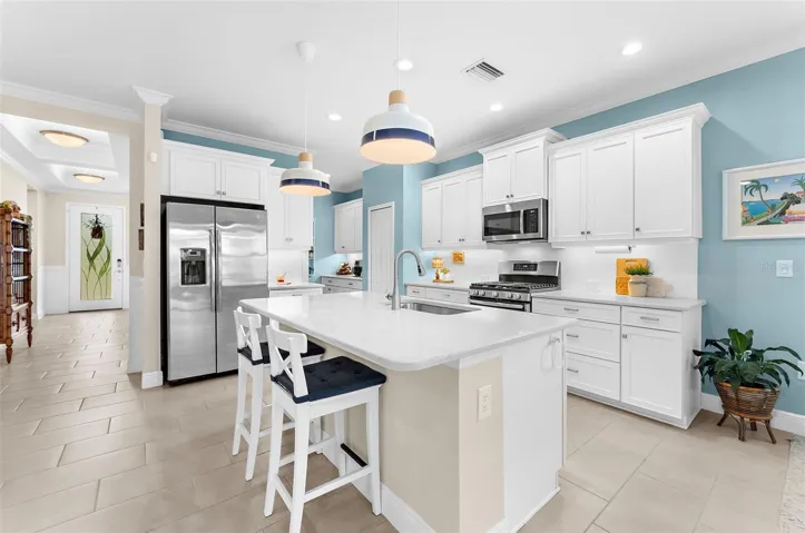 Kitchen is incredible with extra butler pantry in the nook next to the refrigerator