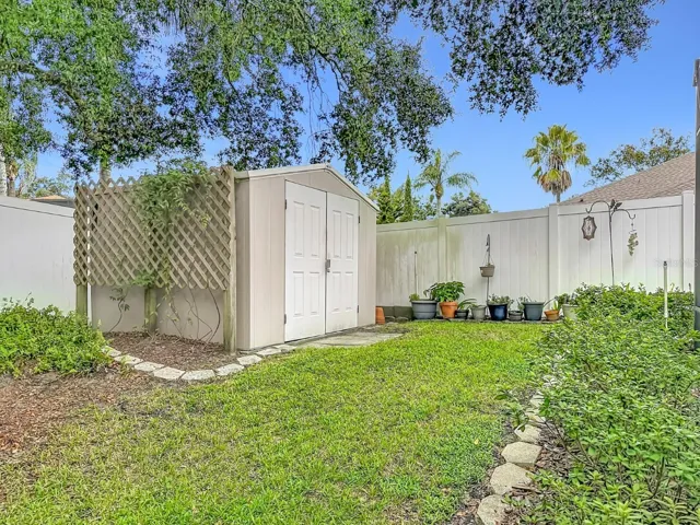 FULL VINYL FENCING, STORAGE SHED