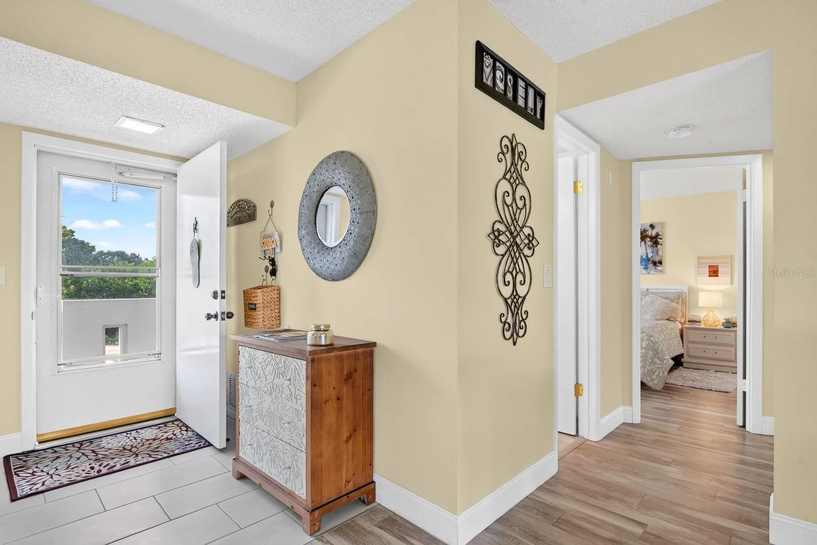 Entrance showing hallway to Guestbedroom and Guest Bath.