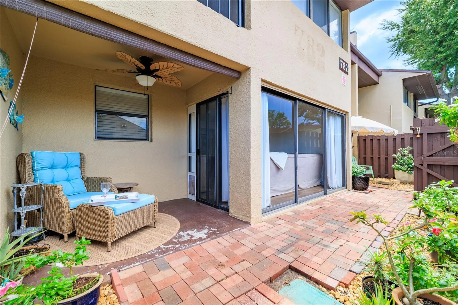 Enjoy the sunshine on your covered pavered patio