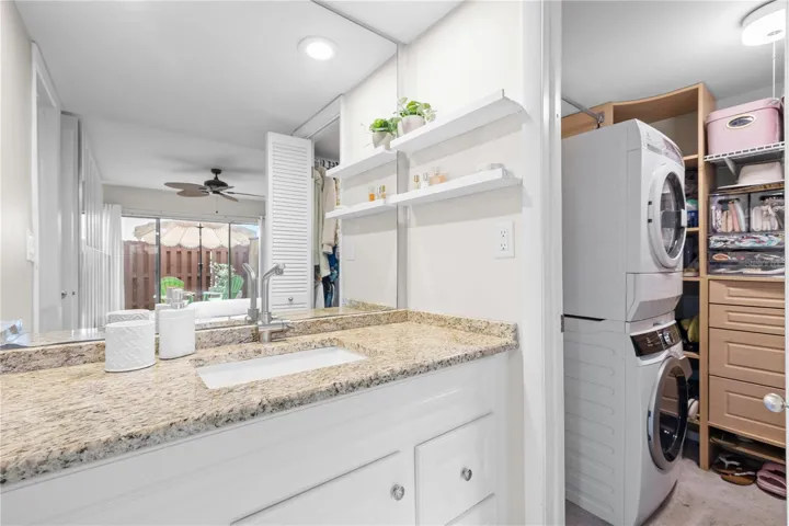 Updated ensuite bath with walk in closet and in unit washer and dryer hookups