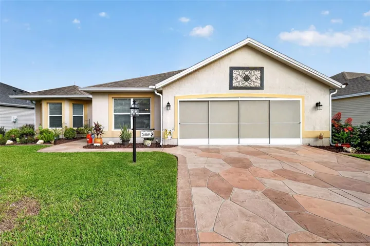 BOND PAID! Welcome to this beautifully maintained 3 BEDROOM, 2 BATH JASMINE DESIGNER with an OVERSIZED 2-CAR GARAGE in the highly desirable VILLAGE OF WINIFRED.