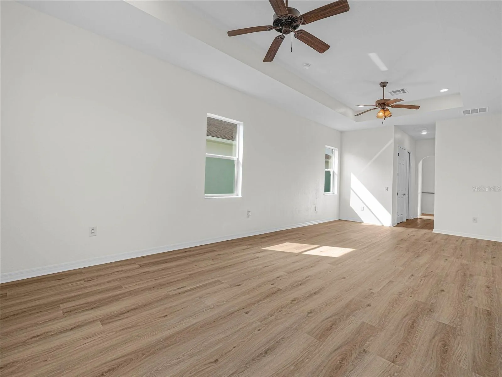 Primary Suite. New Flooring. Windows for Natural Light