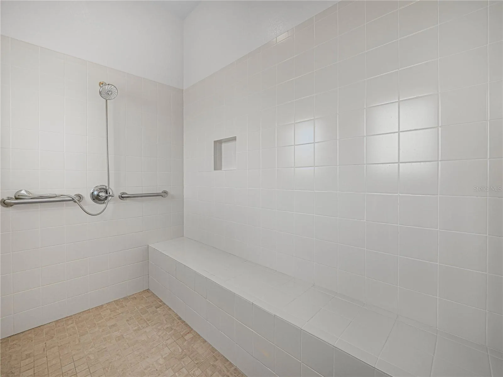 Primary Walk In Shower with Bench