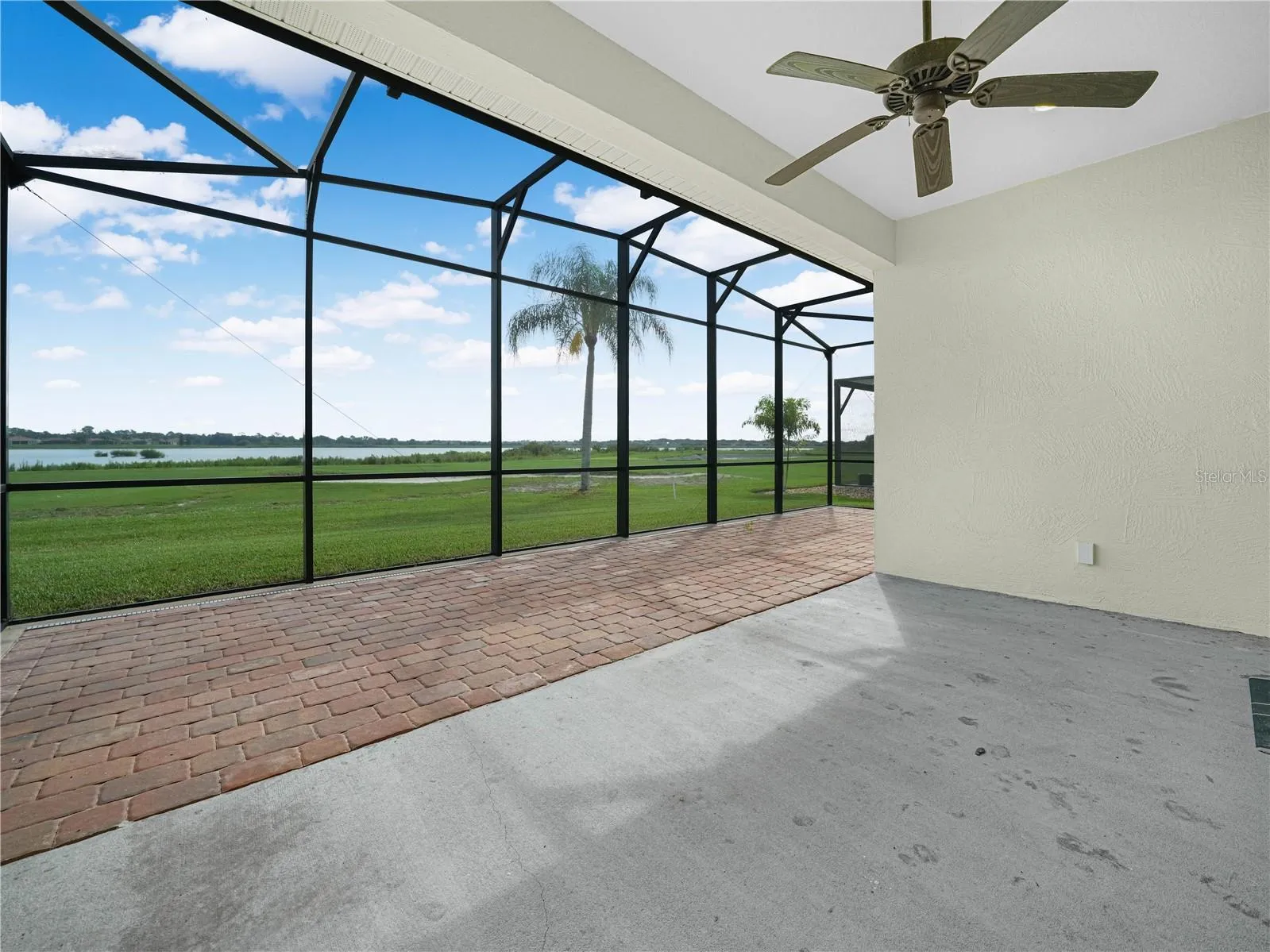 Covered Lanai with Pavers and Extended Birdcage