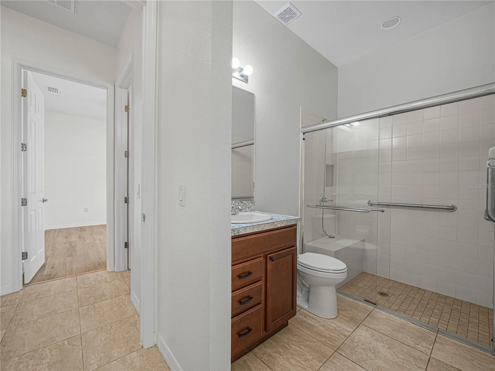 2nd Primary Suite Bath and Hall to Bedroom 3