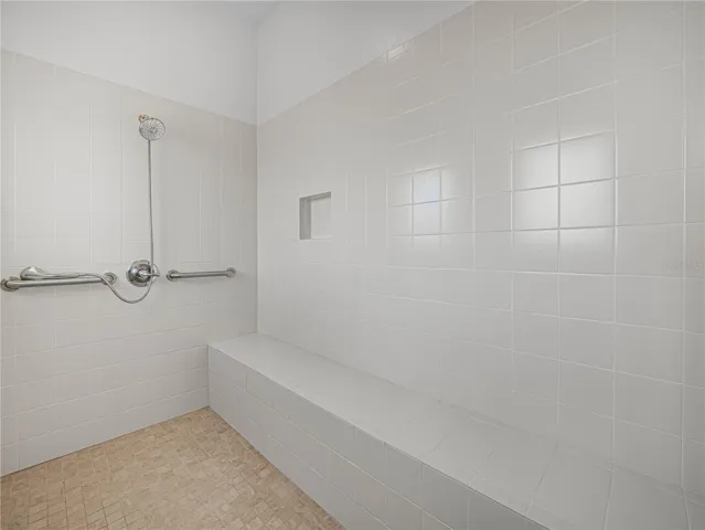 Primary Walk In Shower with Bench