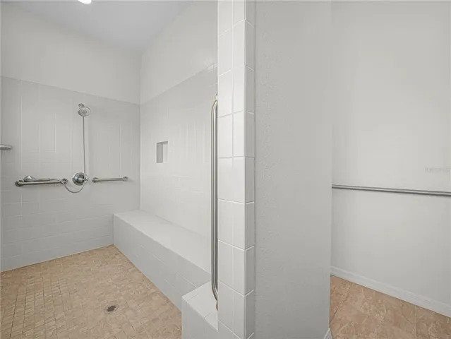 Walk In Shower with Grab Bars and Bench
