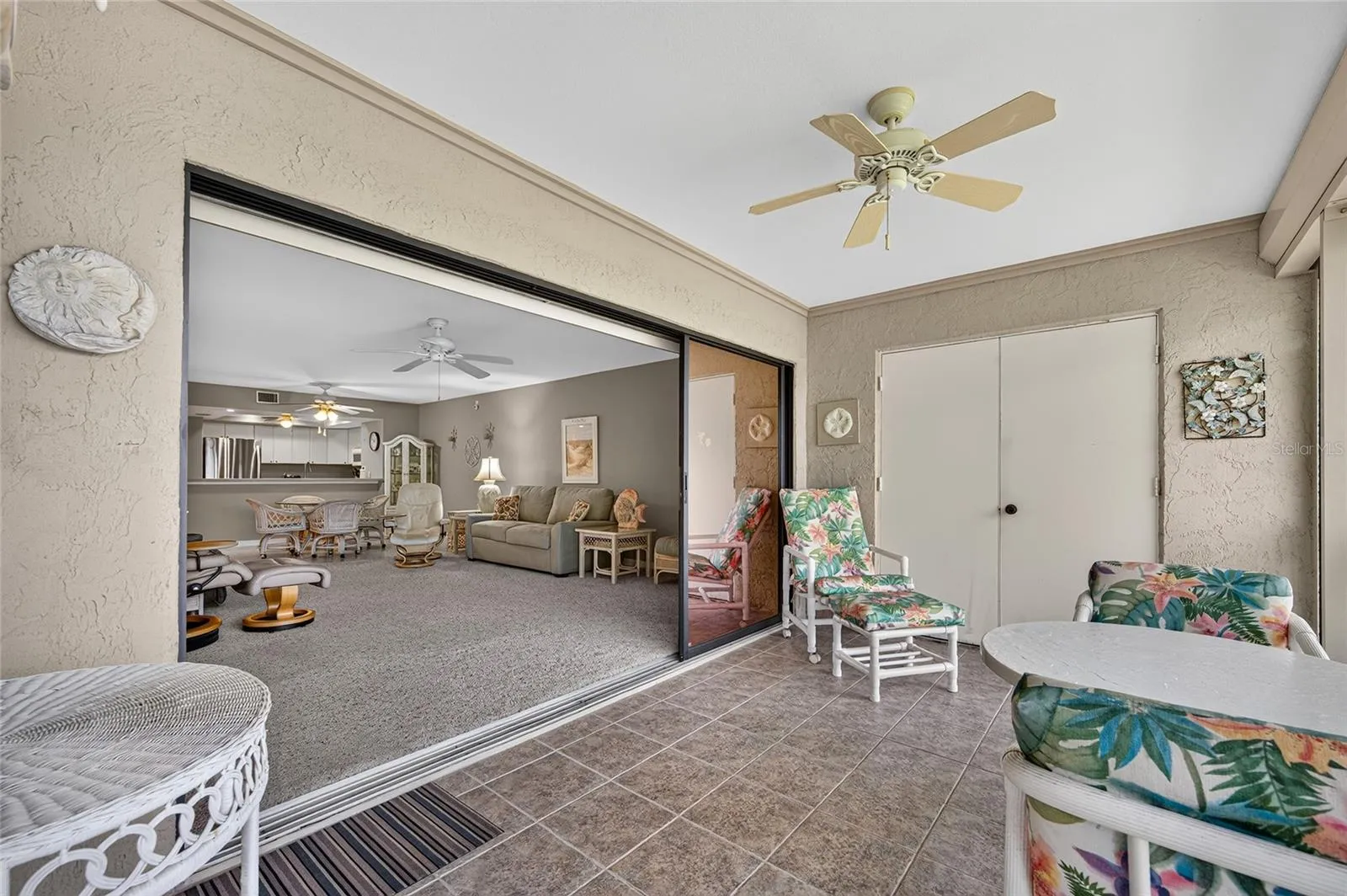 Triple sliders open the indoors to outdoor space