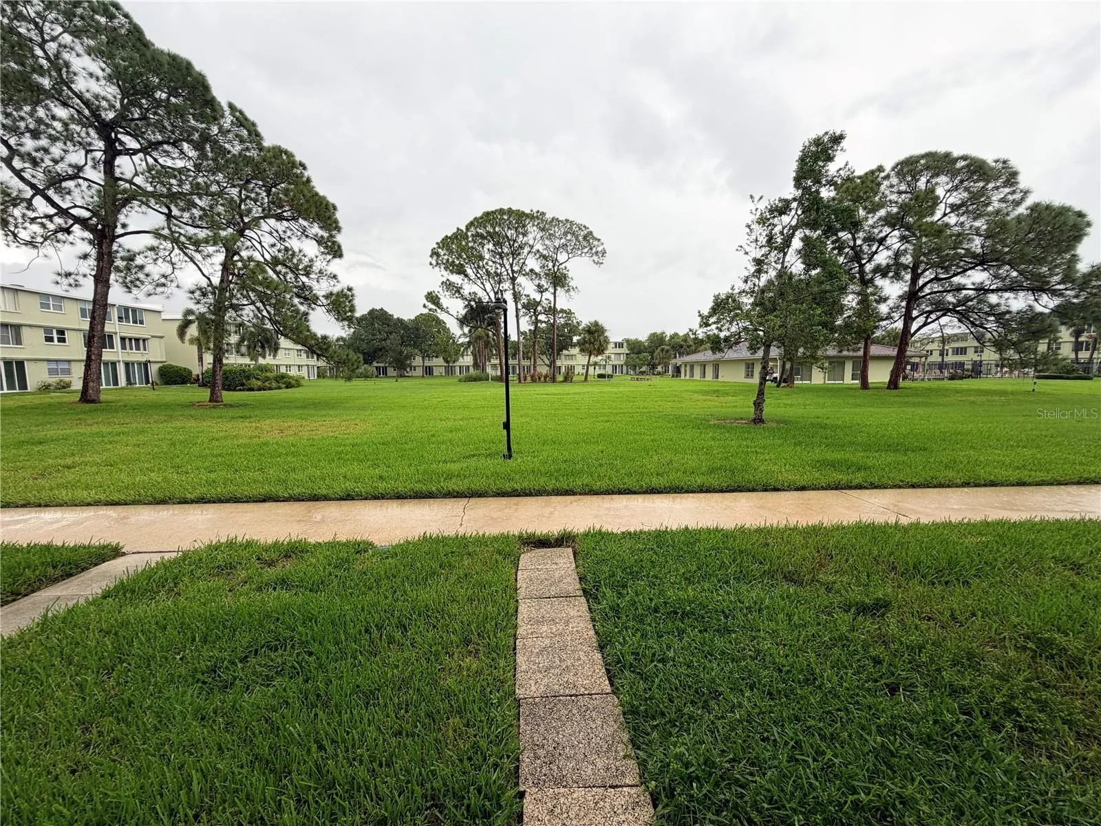 Looking out to the courtyard, pool and clubhouse