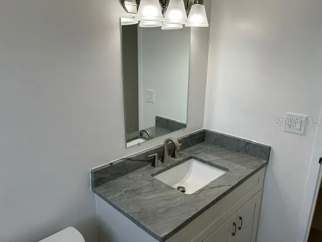 Vanity with Granite Top and Soft Close cabinets and drawers