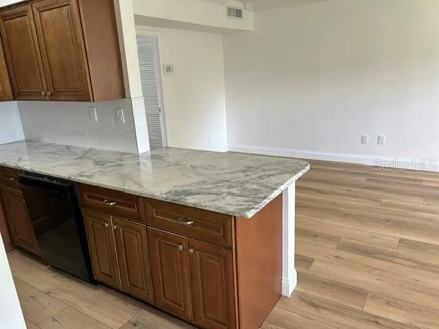Breakfast bar with stool space overlooking Living Room