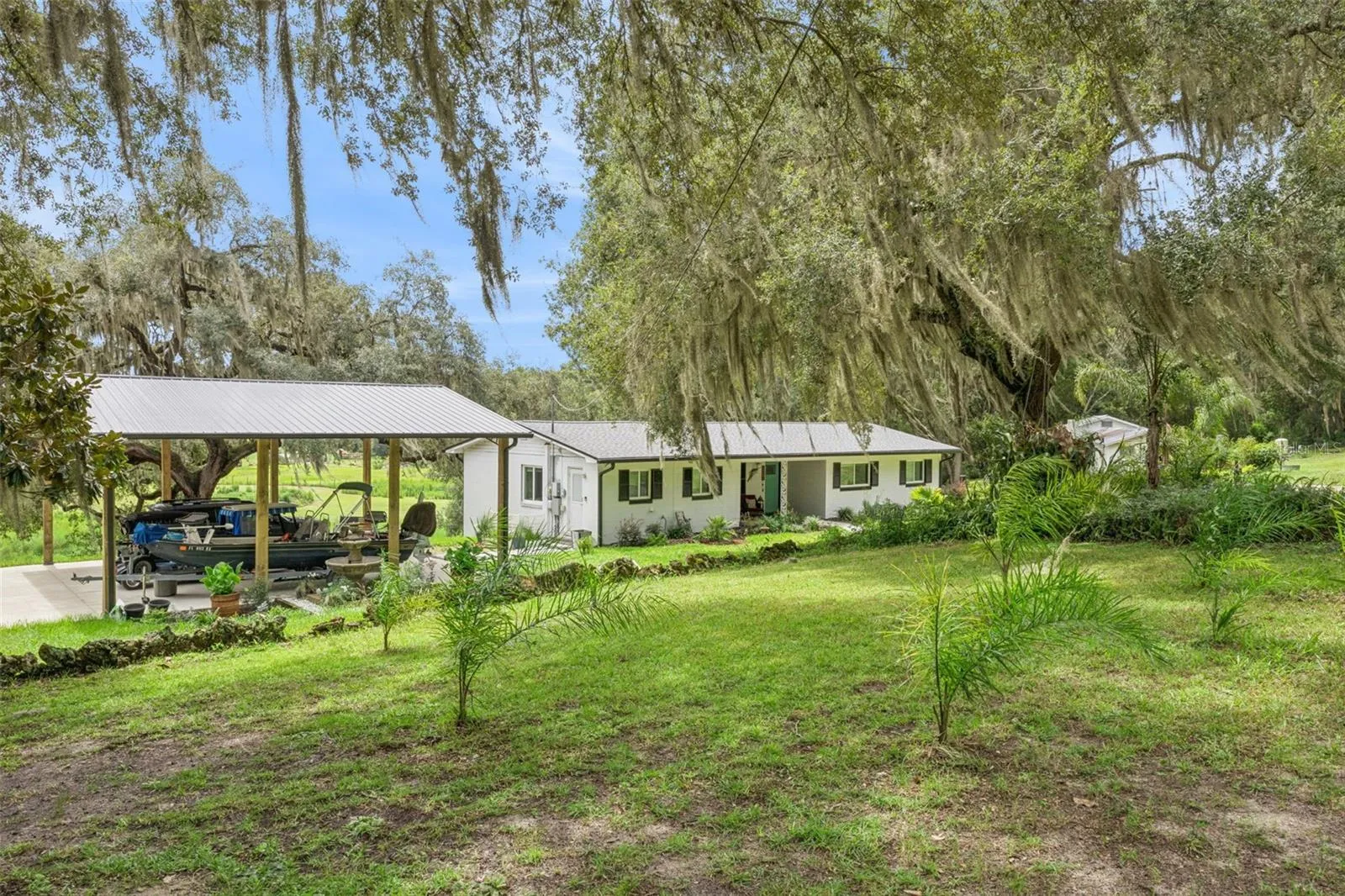 The property's generous acreage offers endless possibilities for outdoor recreation and country living.