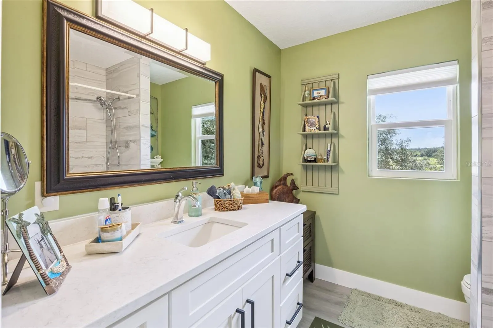 Thoughtful details and natural light fill every room of this lovingly maintained home.
