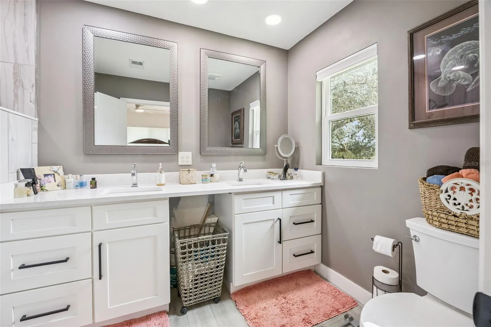 Updated primary bathroom with modern finishes, creating your own personal spa-like retreat.