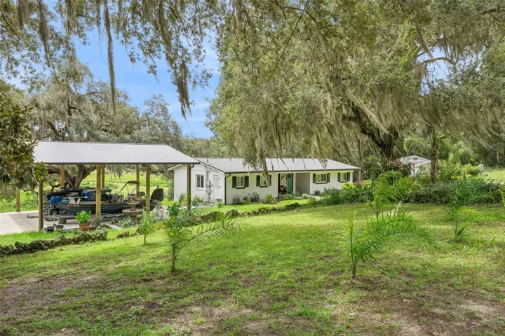 The property's generous acreage offers endless possibilities for outdoor recreation and country living.