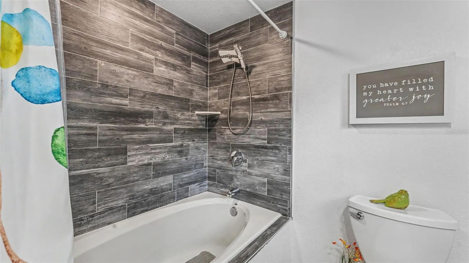 2nd bathroom with beautiful tile and garden tub