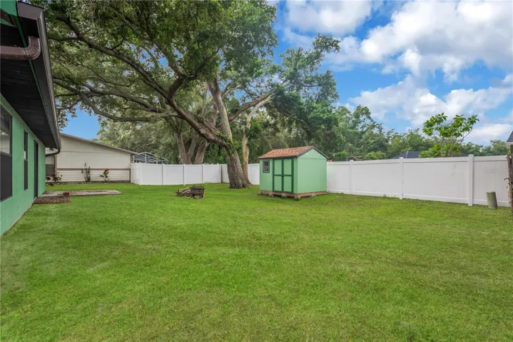 Large backyard with shed