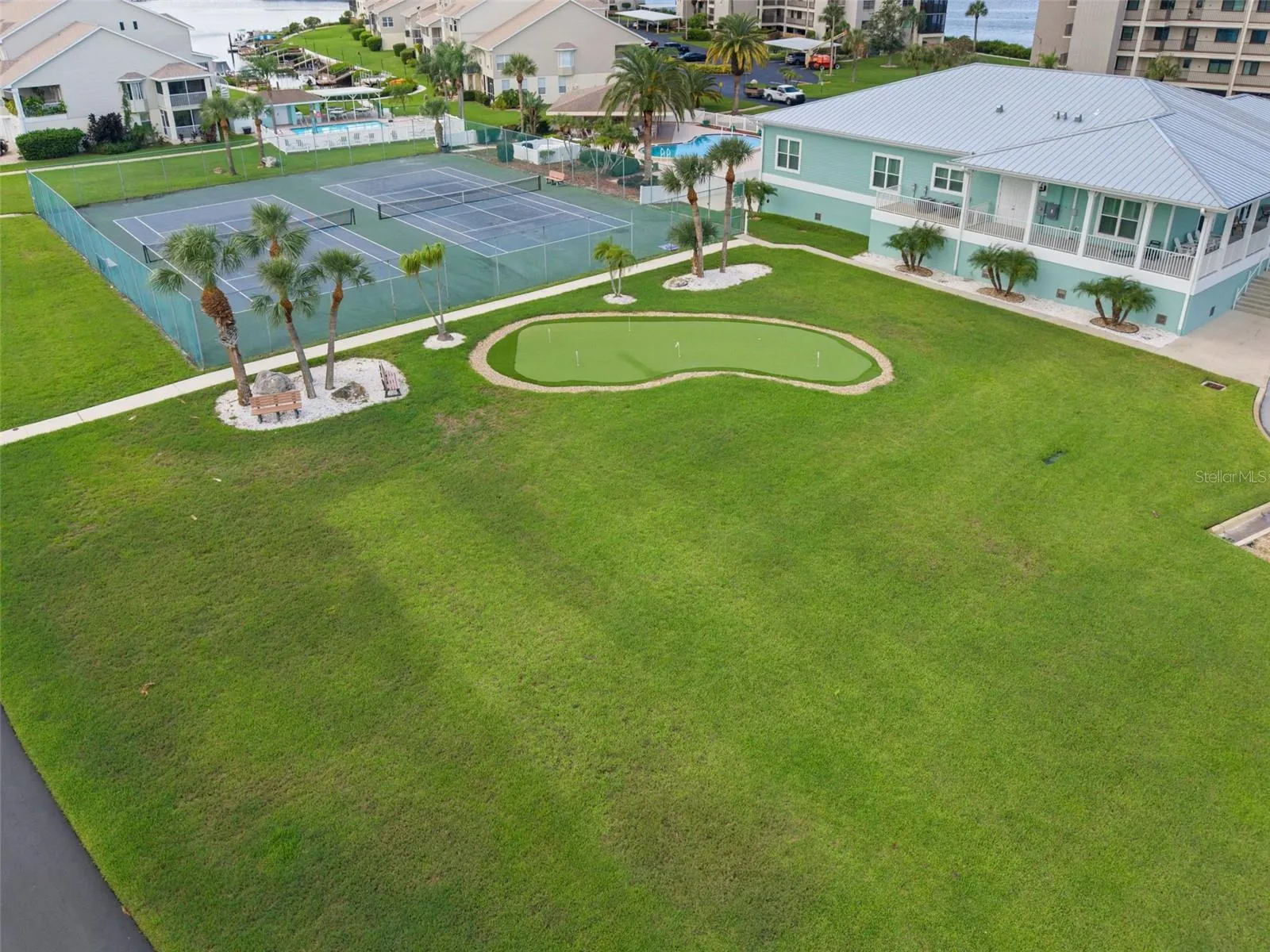 Putting green, tennis and clubhouse